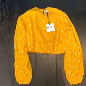 Beach Riot yellow top with white floral appliqués